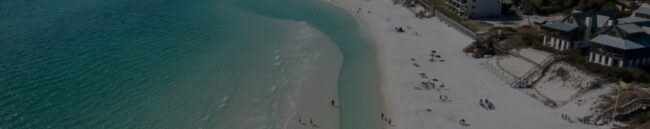 Panama City Beach waves washing up on beach - Gulf Life Real Estate website header - gulf coast waves washing up onto beach in Panama City, Florida