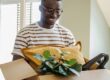 Man opening a moving box
