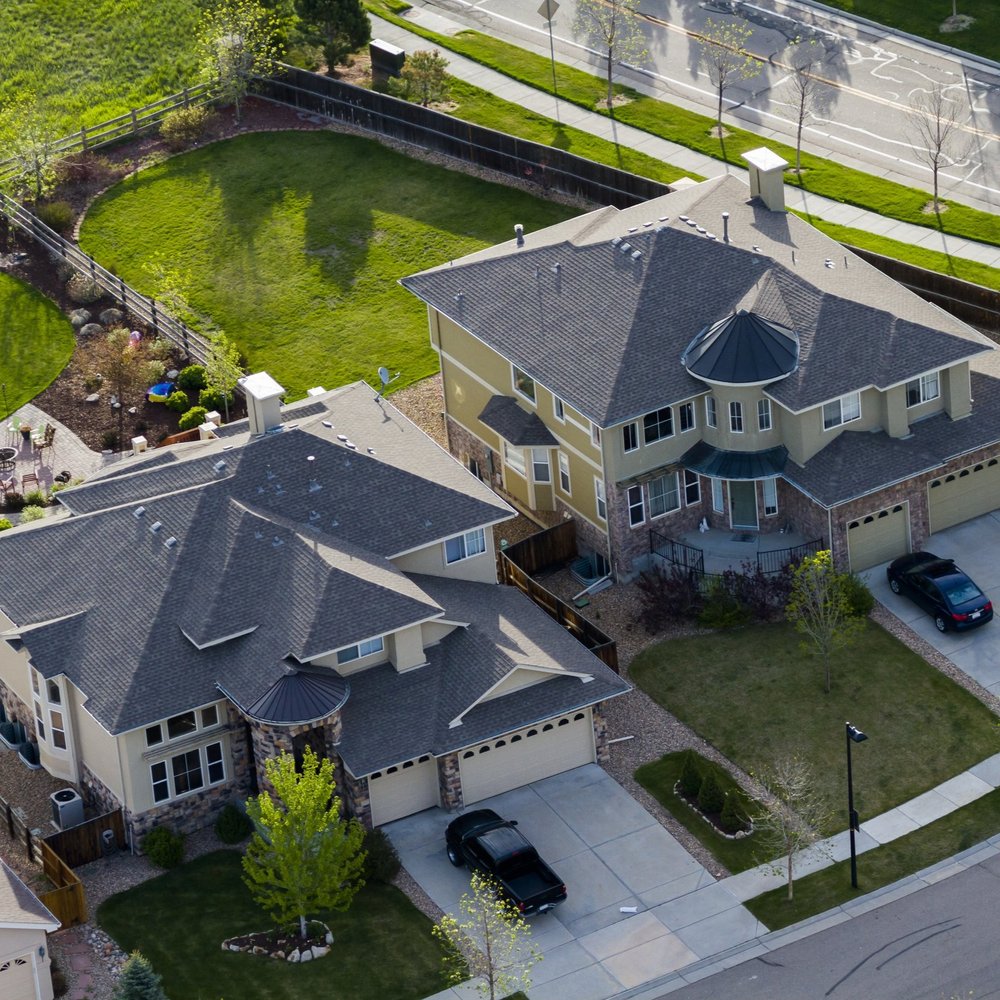 RoofMaintenance Roofs of houses that need maintaining